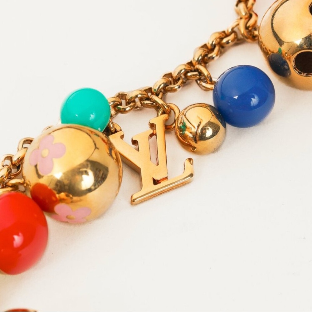 Louis Vuitton bag charm in excellent condition
With 15 charms Made in Italy - Picture 6 of 6